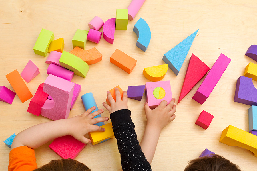 children-sharing-and-playing-with-toys